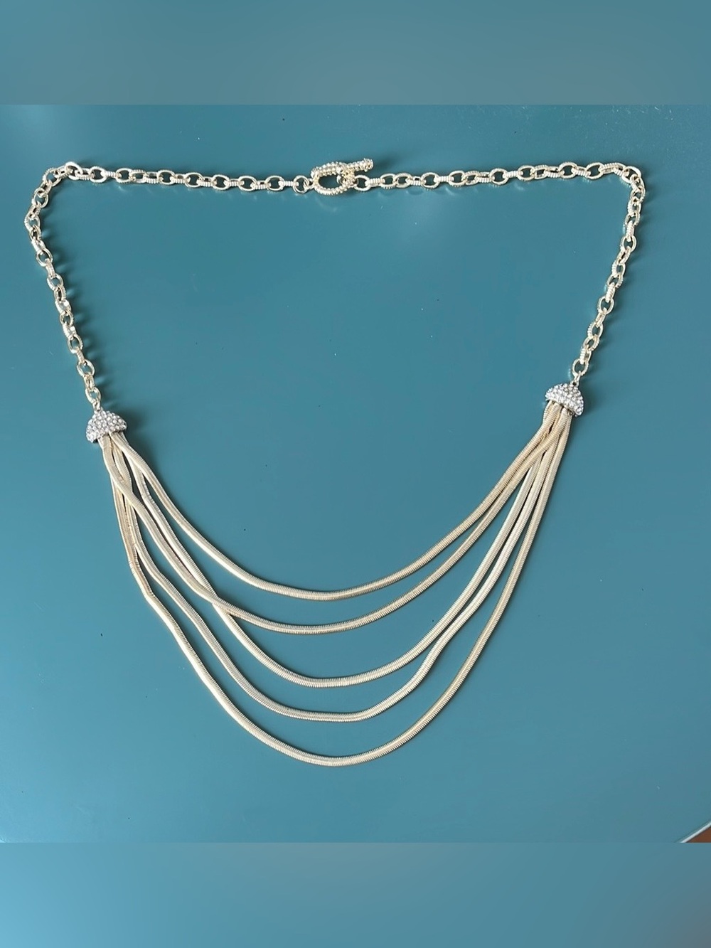 Five-Strand Gold Tone Statement Necklace with Pave Accent